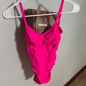 Skims pink flamingo sculpting bodysuit